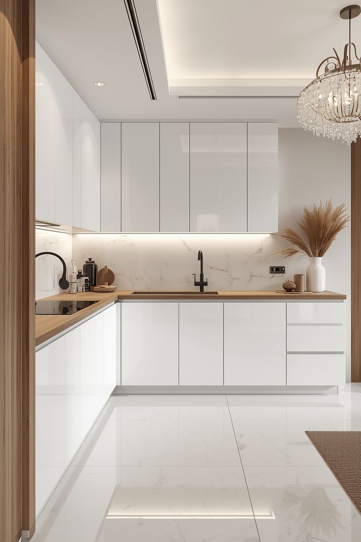 آشپزخانه L شکل مدرن با کابینت سفید براق و نور مخفی